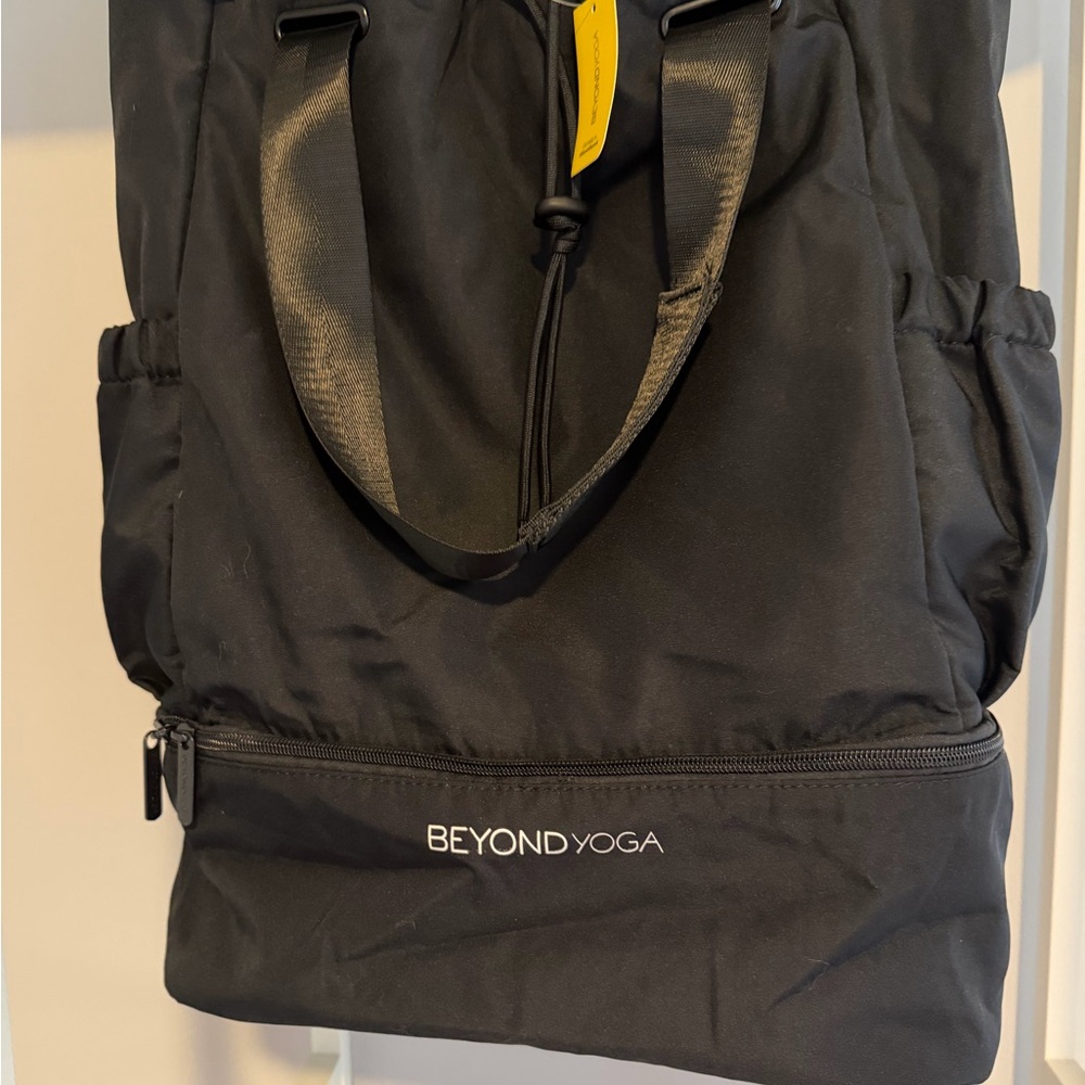 Beyond Yoga Black Convertible Bag/Backpack with bottom shoe compartment
